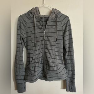 LULULEMON striped zip up jacket with hoodie .